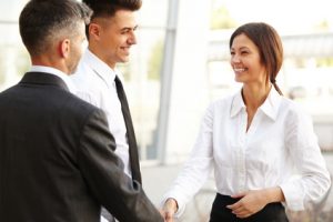 Business Team. People shake hands communicating with each other